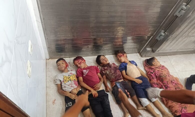 The dead child in his mother’s arms